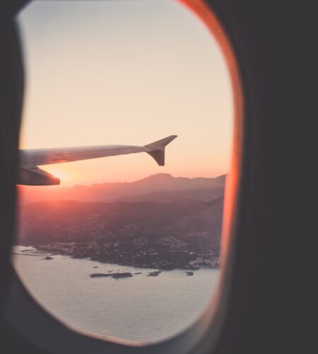 person riding airplane photography